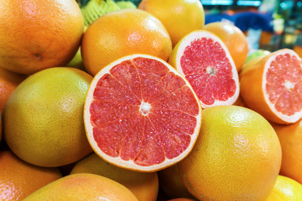 Studio shot of fresh red grapefruit Ruby Grapefruit - Image 1